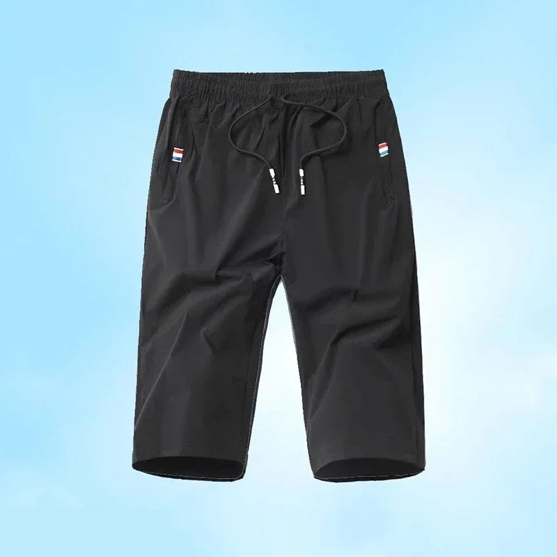 Sport Loose Over Silk Knee Length Pants 2025 Men New Summer Thin Shorts Male Casual Quick Dry Ice Silk Zipper Pocket Capri Pants